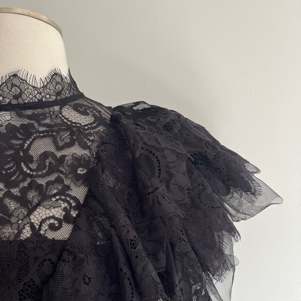 Long voluminous dress with black lace ruffle bodice and animal print skirt